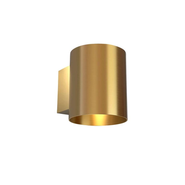 Brass cylindrical wall-mounted light fixture with warm gold finish and open bottom