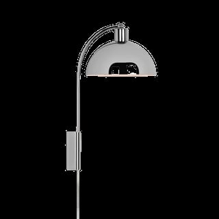 Modern chrome arc floor lamp with dome shade and curved arm against black background
