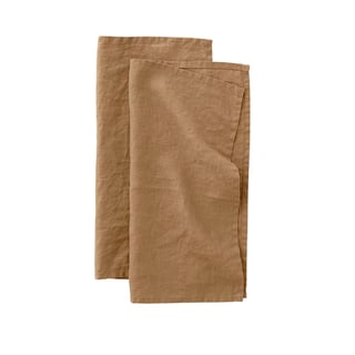 Two folded brown kraft paper napkins or dinner napkins stacked together