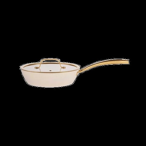 Cream-colored skillet with glass lid and gold-toned handle on black background