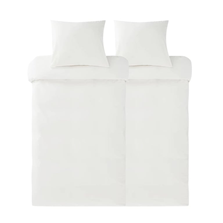 White bed duvet cover set with two pillows arranged on top, viewed from above