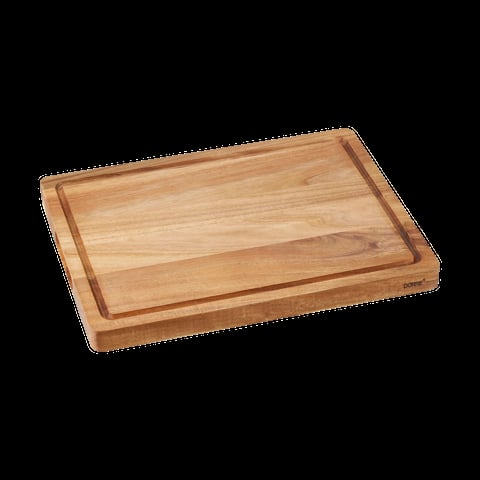 Wooden cutting board with raised edges and groove border for food preparation