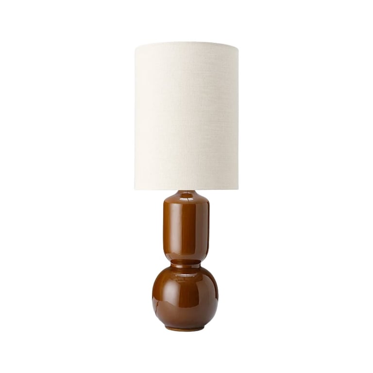 Modern table lamp with wooden spherical base and cream linen cylindrical shade