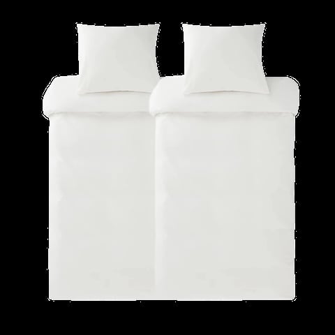 Overhead view of a white bed with two pillows and folded bedding on black background