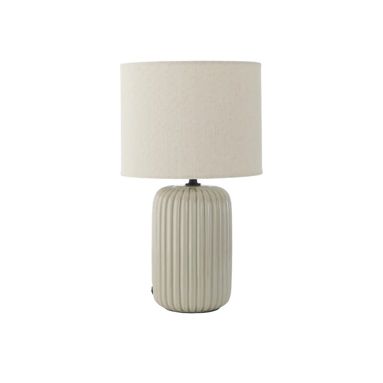 Beige ceramic table lamp with vertical ribbed base and cream cylindrical fabric shade