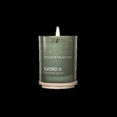Skandinavisk Fjord scented candle in a green glass container with a wooden base and white wick