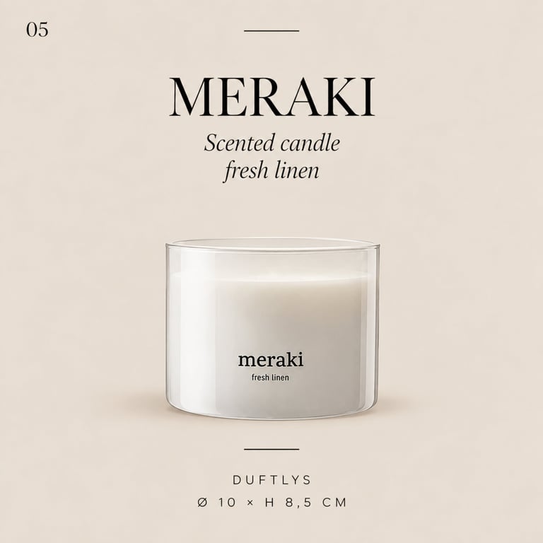 Meraki fresh linen scented candle in a clear glass container with minimalist product presentation.
