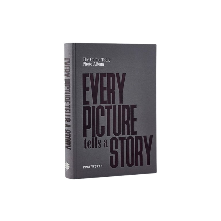 Gray hardcover photo album book titled The Coffee Table Photo Album with large text reading Every Picture Tells a Story